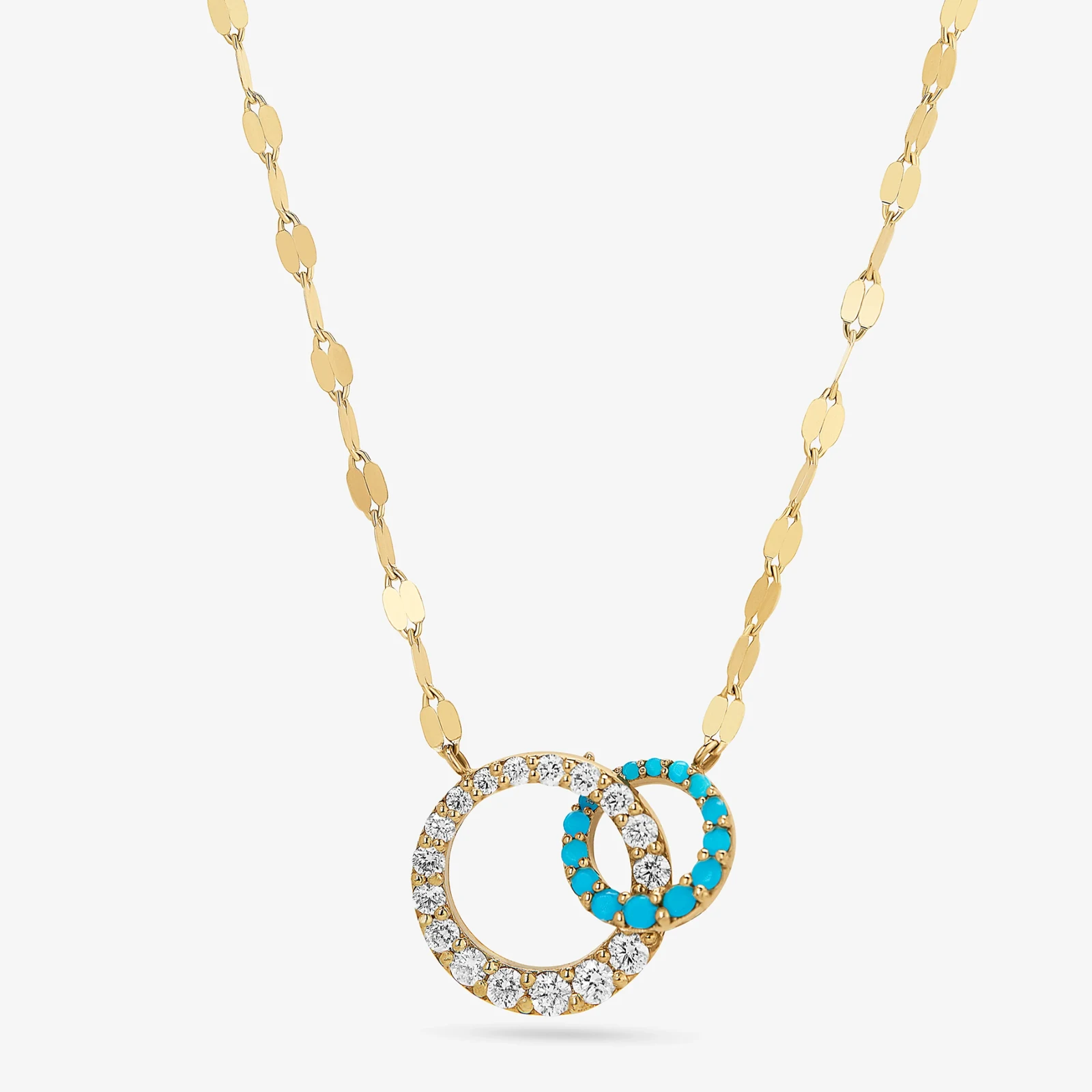 Jewellery — Interlocking circles pair a vivid blue accent with a luminous outline.