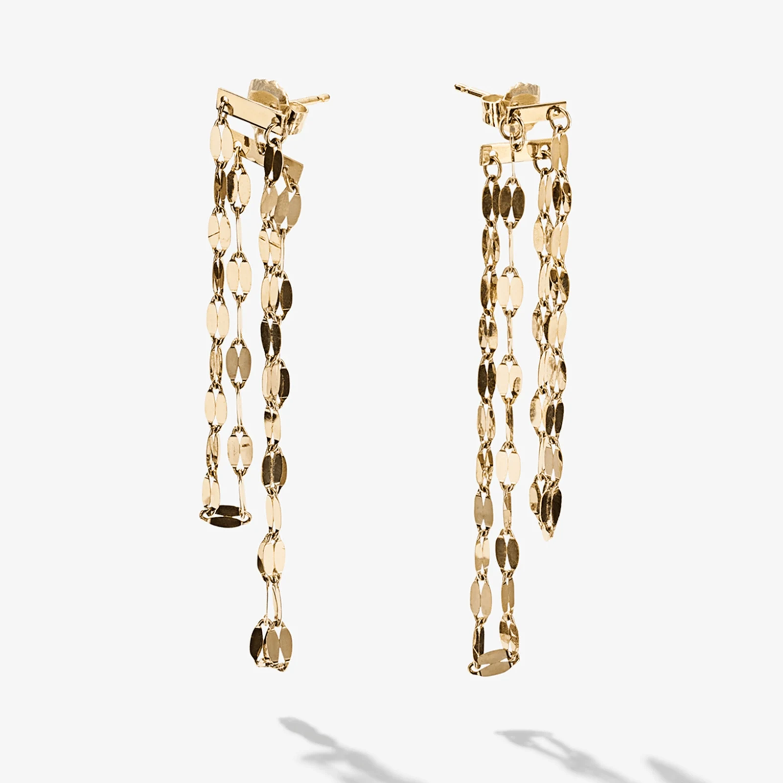 Jewellery — Slender linked strands fall in an elegant, shifting rhythm.