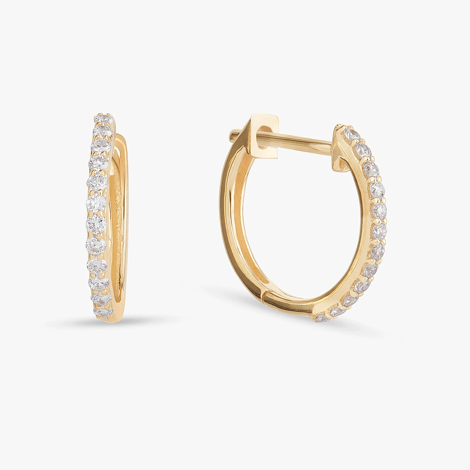 Jewellery — A clean pair of hoops with a continuous line of bright accents.