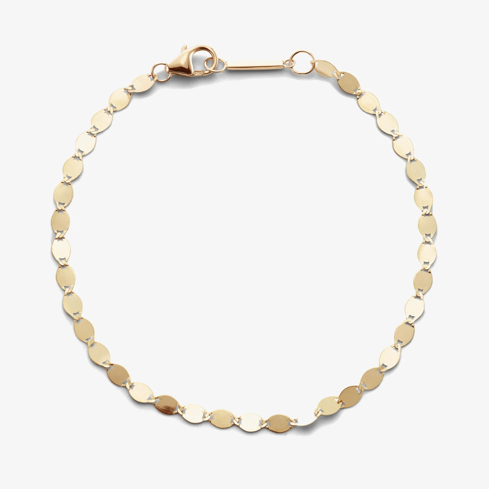 Jewellery — Polished oval links form a fluid, understated bracelet.
